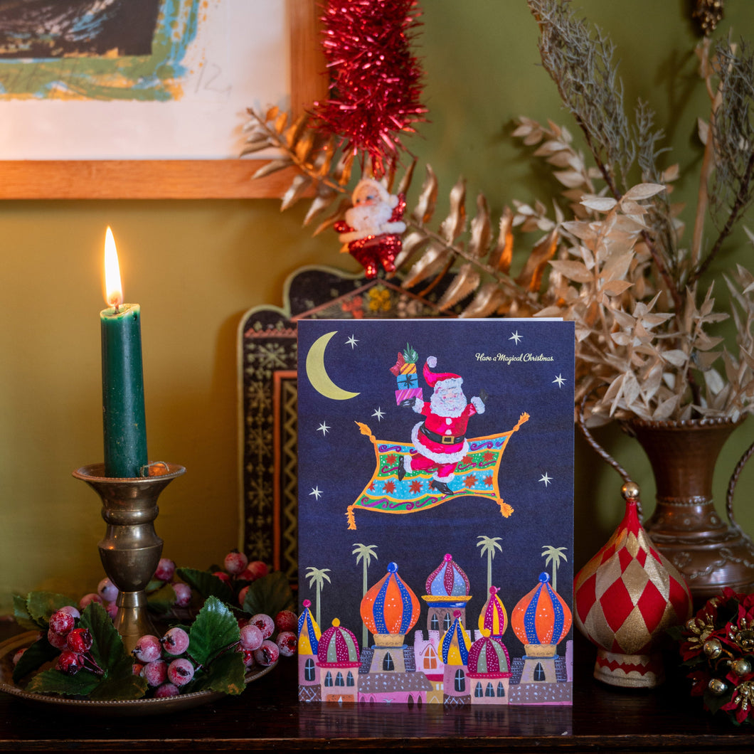Santa on Magic Carpet Christmas Card