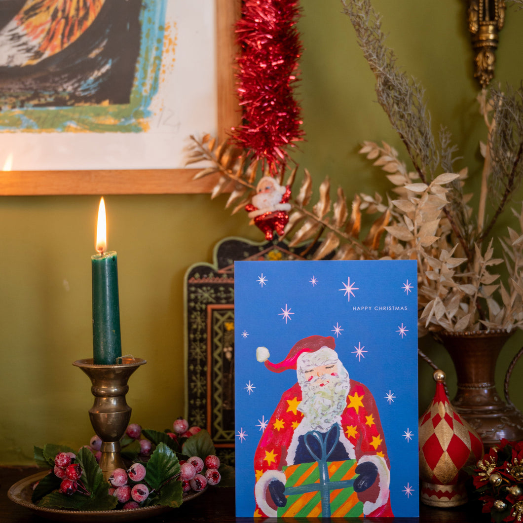 Santa with presents Christmas Card